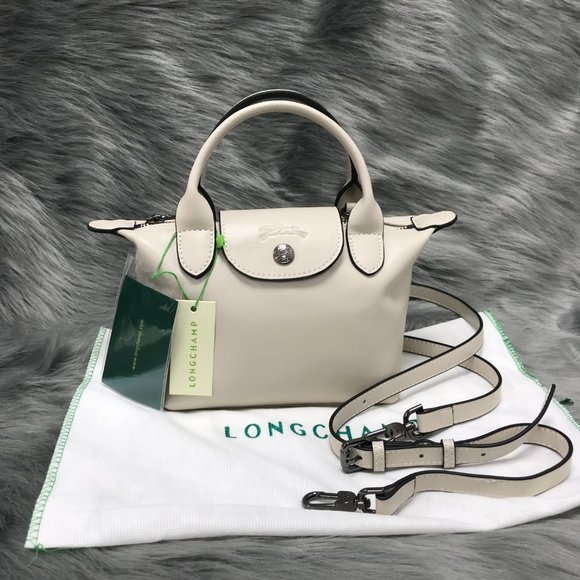Longchamp Handbags - Longchamp Mini Le Pliage Cuir Leather Top Handle Bag Cream